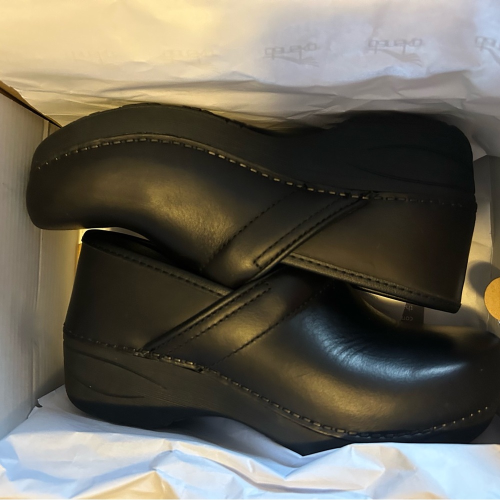 Black Dansko XP 2.0 Clogs. Worn once, excellent condition.